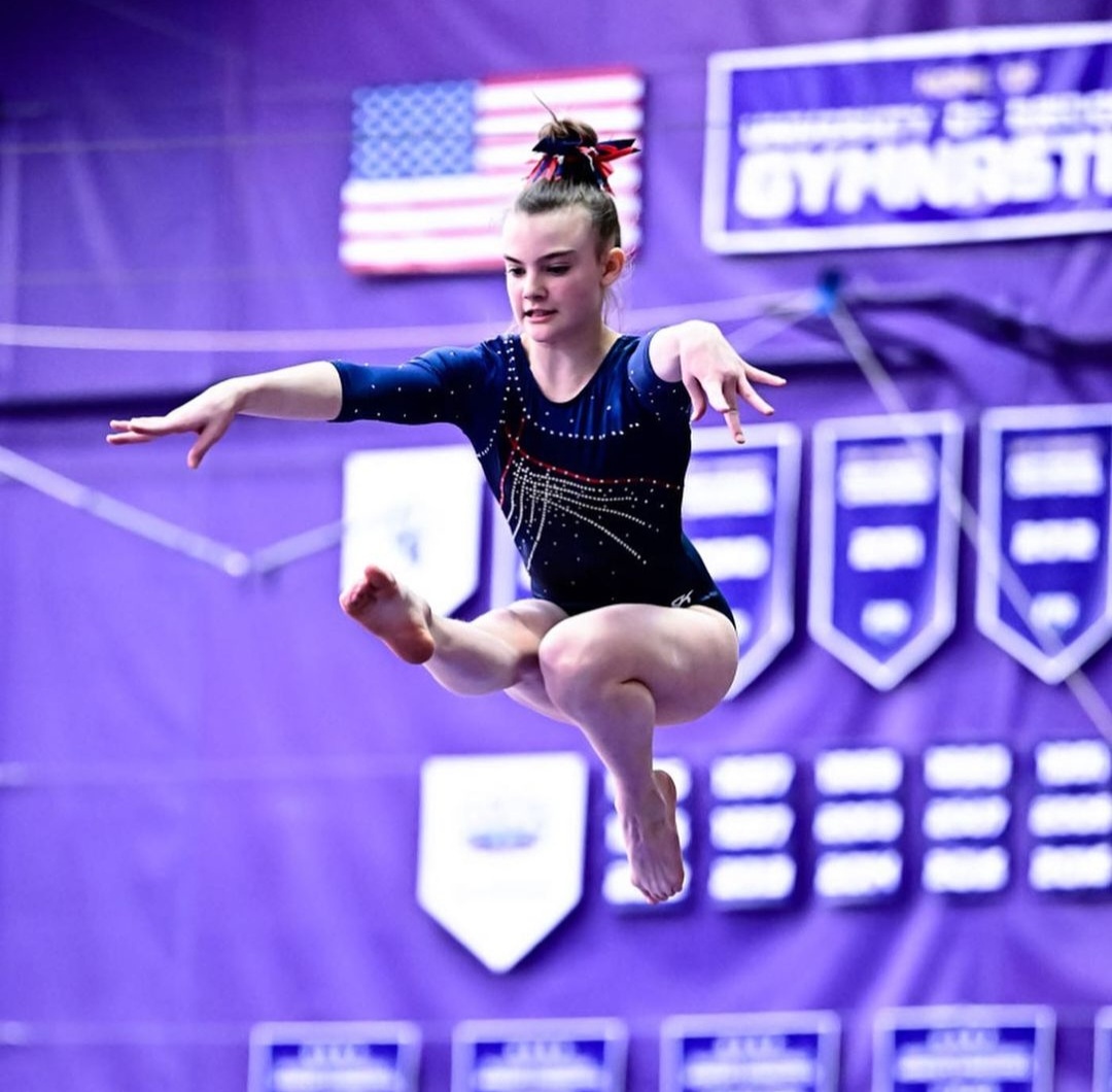 Gymnast Avery Hanson doing a wolfjump gymnastics routine